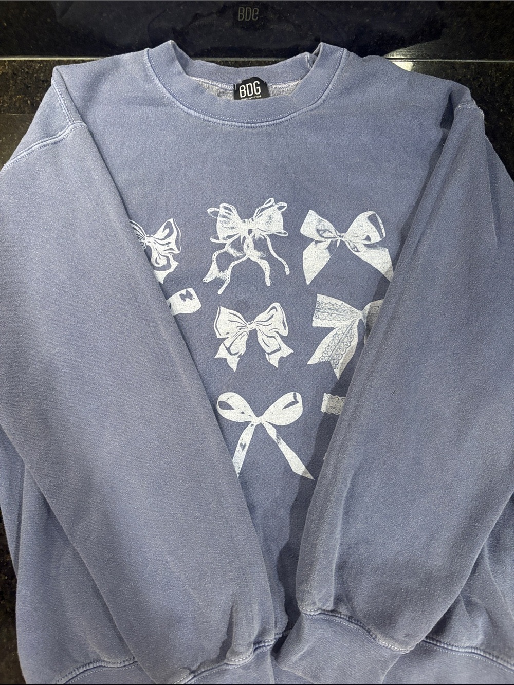 BDG Blue Crewneck Sweatshirt with White Bow Print